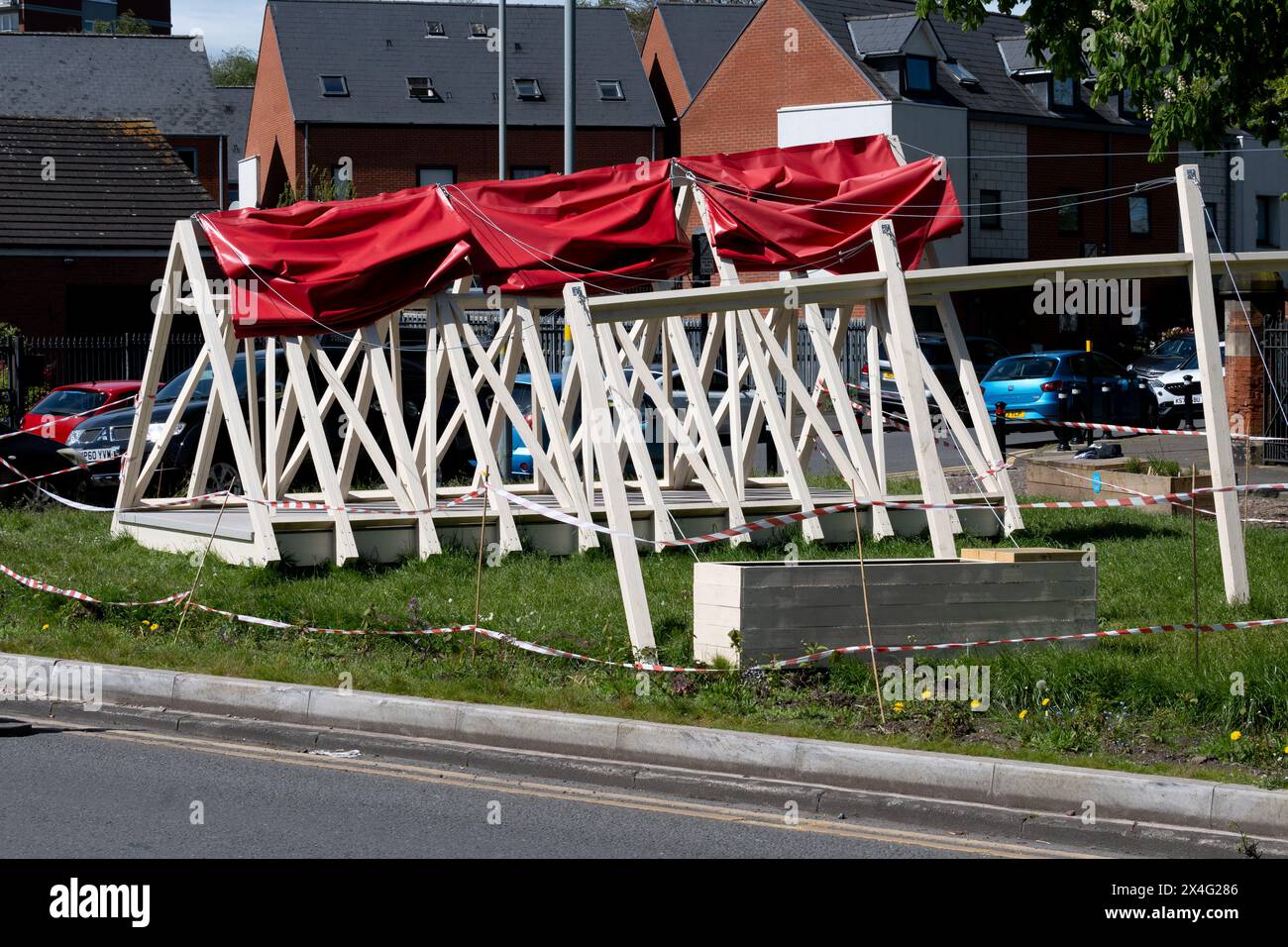 Village green structure outside St. Margaret`s Church, Ward End, Birmingham, UK Stock Photo